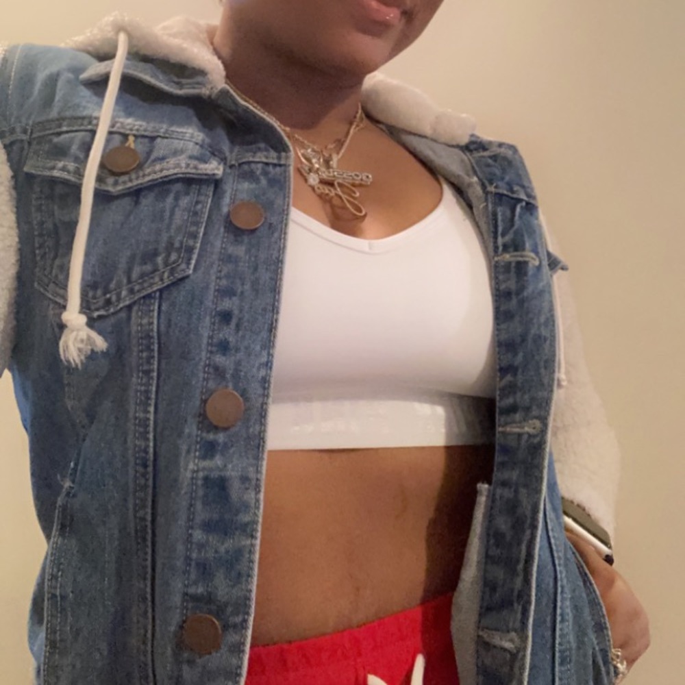 Blue Jean Jacket with white hood and sleeves.